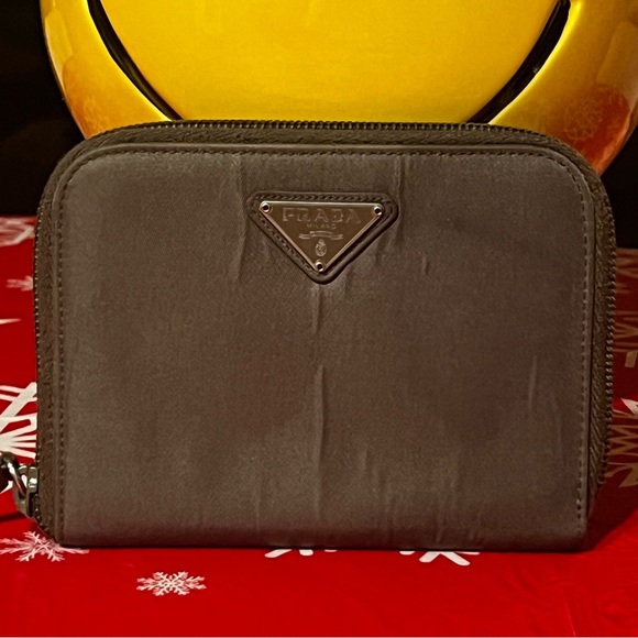 Prada Handbags - PRADA NYLON COMPACT ZIPPY WALLET.